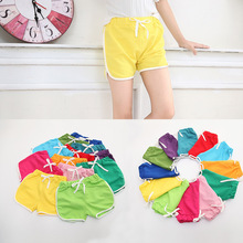 Mùa hè phiên bản Hàn Quốc của kẹo màu bé trai và bé gái Quần áo trẻ em quần short bé gái giản dị 0902 Quần âu