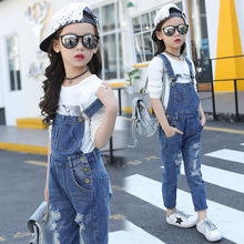 Một thế hệ quần áo trẻ em nữ mùa xuân 2019 phiên bản Hàn Quốc của mùa thu mới áo denim lỗ mới bán buôn Quần yếm