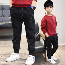 Mùa xuân 2019 phiên bản mới của Hàn Quốc cho quần áo trẻ em trẻ em trẻ em lớn màu trắng đen Quần jean mỏng một thế hệ Quần jean