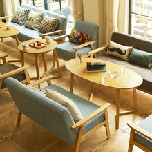 Cafe giản dị nhà hàng căn hộ nhỏ hiện đại tối giản gỗ Bắc Âu đơn sofa bàn ghế trà kết hợp bàn ghế Sofa vải