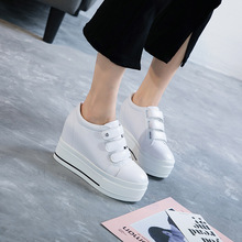 Giày nữ màu trắng hoang dã mới 2019 phiên bản Hàn Quốc của giày đế bệt đế dày Velcro tăng giày nữ thông thường Giày cao