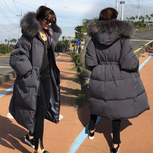 Mùa đông 2018 phiên bản Hàn Quốc của Dongdaemun Hàn Quốc áo khoác nữ dài phần cổ áo lông lớn bên ngoài dây rút lỏng kích thước lớn dày Áo khoác nữ