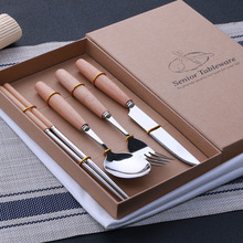 Bán buôn dao bằng gỗ xử lý bít tết và muỗng nĩa phù hợp với dao kéo xách tay ba mảnh thép không gỉ đũa gia đình muỗng bốn Bộ dao kéo