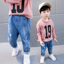 Quần trẻ em 2018 mùa thu mới cho bé trai quần jeans Trẻ em nhỏ phiên bản Hàn Quốc của quần dài màu rắn hoang dã Quần jean