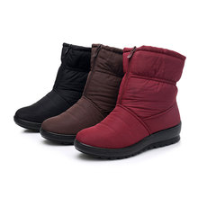 Giày cotton mùa đông mới cho bé ủng vải bạt chống trượt cộng với đôi giày nhung cotton dày ấm tuyết một thế hệ Giày tuyết nữ