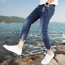 2019 xuân hè quần jeans nam phiên bản Hàn Quốc của quần lọt khe nam thanh niên thời trang lỗ chín quần thủy triều Cao bồi tan vỡ