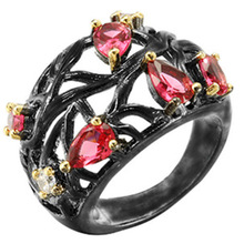 Chen Rui chúc nhẫn vàng đen sáng tạo xuyên biên giới nữ châu Âu và châu Mỹ kim cương ruby ​​thả hình quả lê nhẫn rỗng Nhẫn