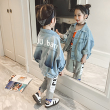 Áo khoác bé gái mùa xuân 2019 mới cho trẻ em Hàn Quốc Quần áo trẻ em nước ngoài Cô gái trẻ lớn áo sơ mi lỏng lẻo Áo trẻ em