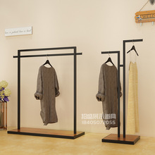 Cửa hàng quần áo nữ quần áo đơn giản đảo trưng bày kệ kệ bán quần áo kệ sàn đứng kệ trưng bày trung gian Đạo cụ trưng bày quần áo