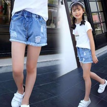 Mùa hè trẻ em tua rua cô gái quần short denim 2019 mới thời trang Hàn Quốc quần denim nóng bỏng một thế hệ Quần jean
