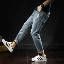 Quần jeans 9 lỗ nam lỗ rộng phiên bản Hàn Quốc của xu hướng Harlan giản dị cỡ lớn chân hoang dã 9 điểm jeans Quần Harem