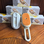Explosions cross-border pet electric spray comb cat and dog one-touch spray does not hurt the skin massage comb to clean floating hair